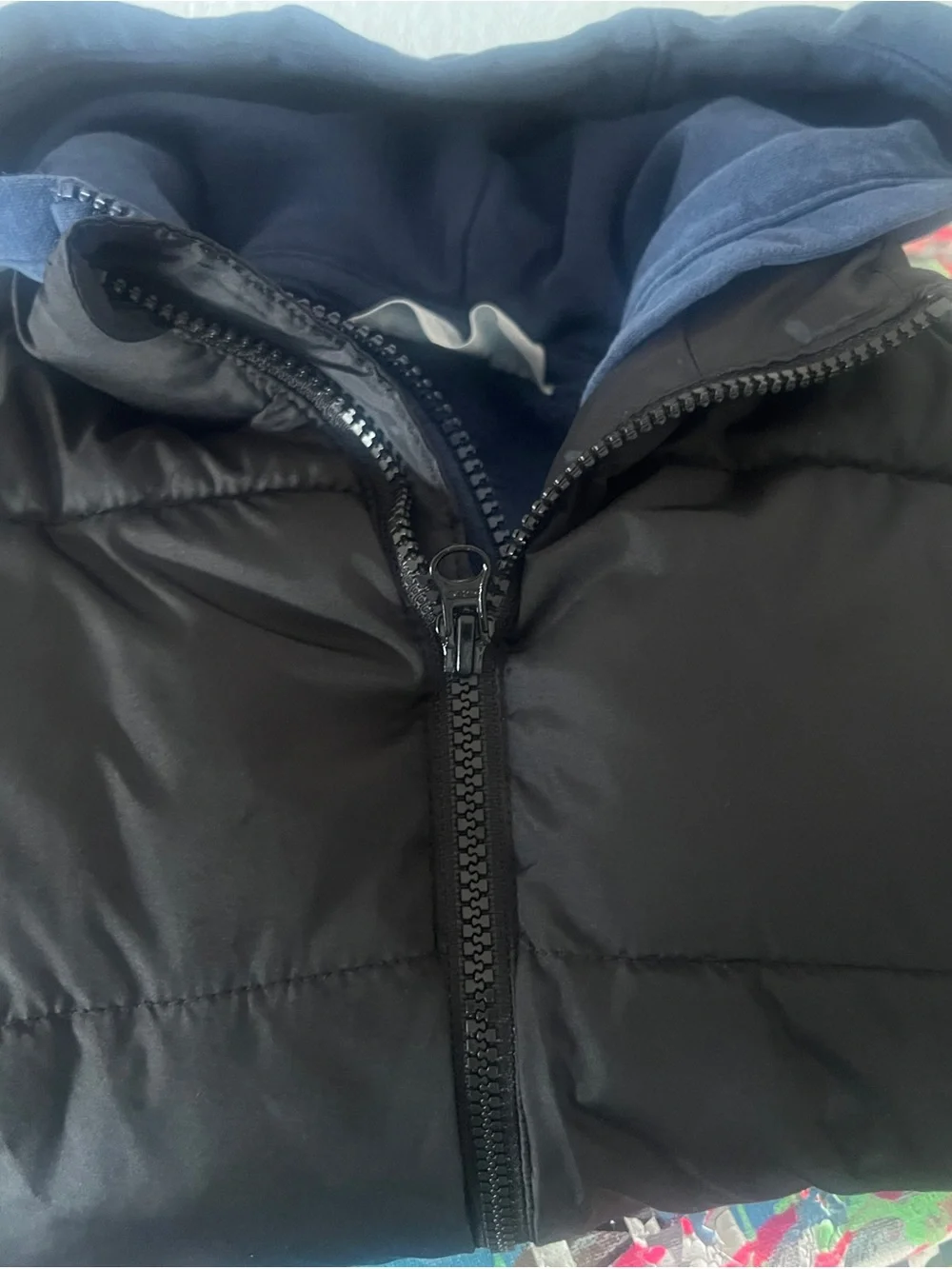 Old Navy Kids Black Puffer Vest with H&M Blue Hoodie together for a Layered Look